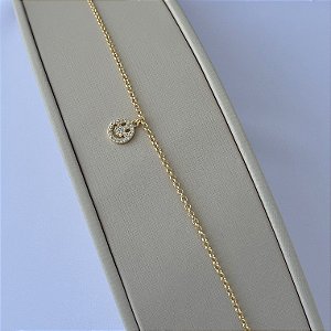 Pulseira com pingente de smile cravejado em banho de ouro 18k