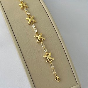 Pulseira em zircônias navete e X lisos em banho de ouro 18k