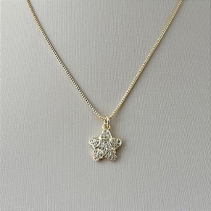 Colar estrela do mar cravejada em banho de ouro 18k