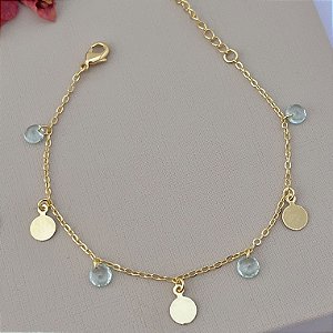 Pulseira moedas e zircônia azuis em banho de ouro 18k