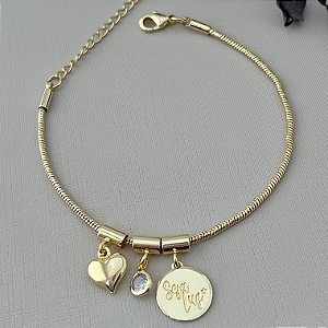 Pulseira com pingentes seja luz, coração e ponto de luz em banho de ouro 18k