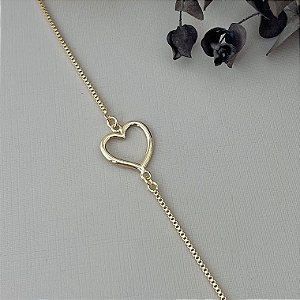 Pulseira com coração vazado em banho de ouro 18k