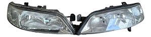 Par Farol Gm Vectra 00/05 Original Cibié P/ Motor Elétrico Ambos Lados