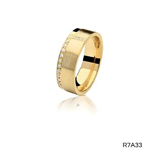 ALIANÇA R7A33 COM PEDRA 10K