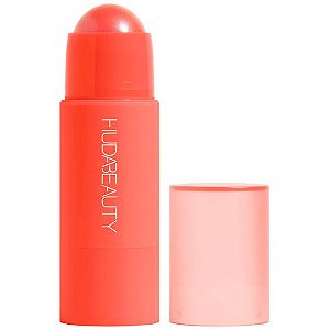 Coral Cutie - a bright orange-pink HUDA BEAUTY Cheeky Tint Cream Blush Stick