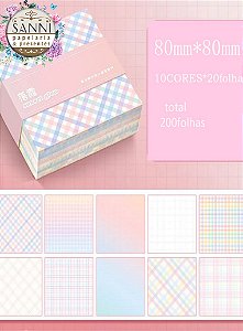 Bloquinhos de anotações com estampas de xadrez.
