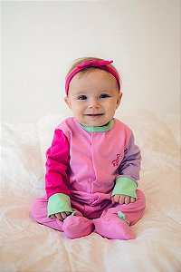 Macacão Magnético Rosa, mangas lavanda e pink e detalhes menta - 9 meses