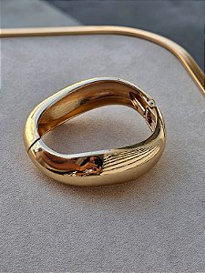 Bracelete articulado ondulado dourado