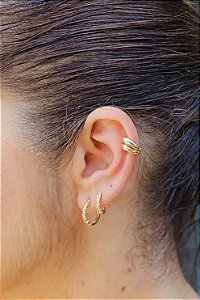 Piercing fake duas garras dourado