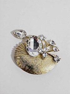 Broche abstrato dourado