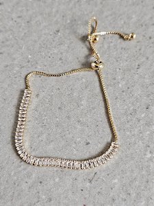 Pulseira riviera baguete gravatinha dourada