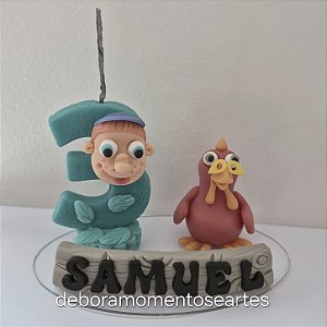 Topo de bolo com vela cocorico ou show da Luna