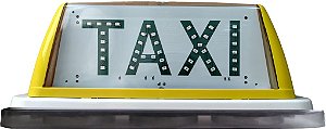 02 - Luminoso Cristal Amarelo Com Imã - Palavra Taxi em LEDs Verdes.