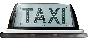 08 - Luminoso Cristal Preto Com Imã - Palavra Taxi em LEDs Verdes.