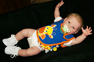 Bebê Reborn Menino Honey 51 Cm Olhos Abertos Com Cabelos Loiros Implantados Fio A Fio Promoção