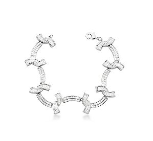 PULSEIRA COM CURVAS E ZIRCÔNIAS BAGUETES BRANCAS BANHADA A RÓDIO