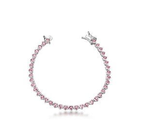 PULSEIRA RIVIERA COM CORAÇÕES ROSA CLARO BANHADA A RÓDIO BRANCO