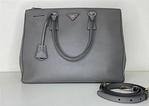 PRADA BOLSA CINZA RATO