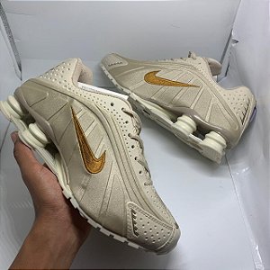 nike shox 4 molas dourado