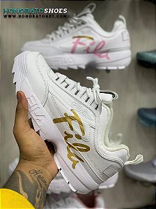 fila disruptor dourado