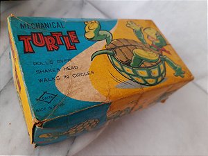 Brinquedo em lata vintage a corda de tartaruga que se mexe, anda e vira , marca Daiya Japão