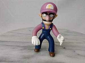 Boneco articulado nos braços de Waluigi do.Supermario  2008. Nintendo,10.cm.