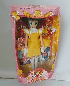 Boneca Sakura cardcaptor de vestido amarelo,28 cm, sem uso, de 2002,  na caixa lacrada.