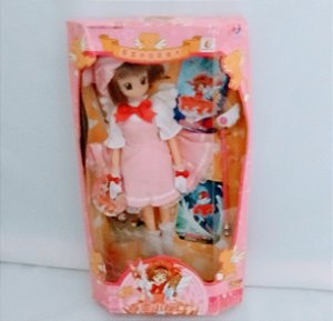 Boneca Sakura cardcaptor de vestido rosa ,28 cm, sem uso, de 2002,  na caixa lacrada.