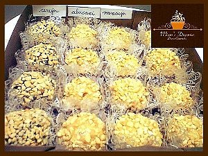 Caixa com 16 brigadeiros.