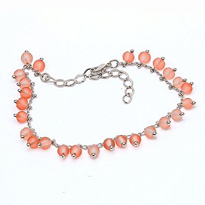 PULSEIRA BANHADA EM RÓDIO BRANCO COM BOLINHAS COR CORAL