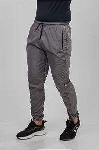 CALÇA CORTA VENTO REPELENTE ÁGUA CINZA