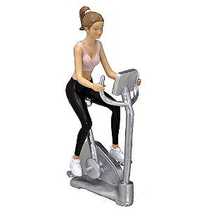 ESCULTURA DECORATIVA MULHER FIT COM BICICLETA ERGOMETRICA