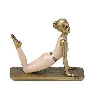 ESCULTURA MULHER YOGA DECORATIVA ROSA E DOURADO