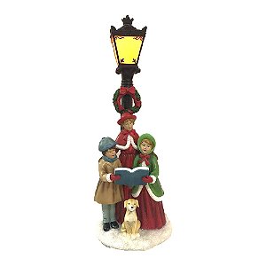 ESCULTURA CORAL NATAL CAROLER FAMILY NO POSTE DE LUZ C LED