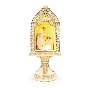 SAGRADA FAMILIA C/LED BEGE E DOURADO 27CM NO PEDESTAL 2AAA