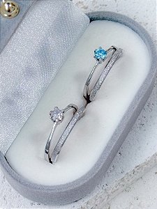 Par de aliança Minilover + Solitários cristal e azul - Aço Inox