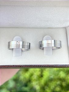 Par de aliança Frisos com pedra - Aço inox