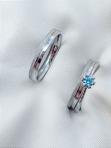 Par de Aliança Alice + Solitário azul - Aço inox