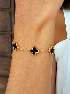 Pulseira de trevos preto de aço com banho de ouro