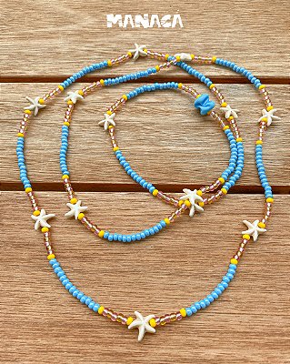 Guia de Erês – Miçangas Jablonex Azul Perolado, Rosa e Dourado com Estrelas do Mar de Howlita e Firma de Murano | Umbanda e Candomblé