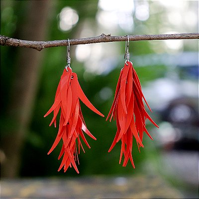 Brinco pena tecno laranja