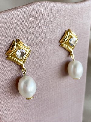 Brinco Lumière- ouro amarelo 18k, safira incolor e pérola