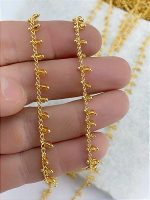 Corrente Grume com miçanga bolinha - banho ouro 2 milésimos com verniz - 1 metro