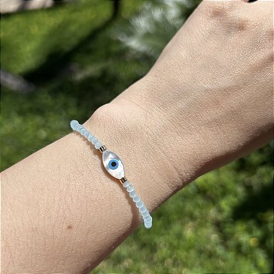 Pulseira silicone cristais azul claro e olho grego