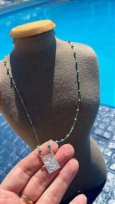 Colar longo Turquesas com medalha Espírito Santo de madrepérola