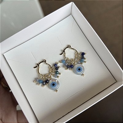 Brinco banho ouro argola com pedras azuis e olho grego