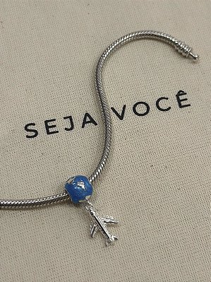 Berloque Separador Volta ao Mundo de Avião