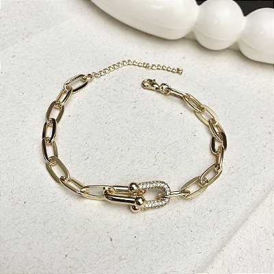 Pulseira Inspiração T Cravejada Banhada em Ouro