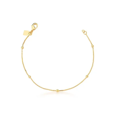 Pulseira com Esferas Dispersas e Lisas Ouro