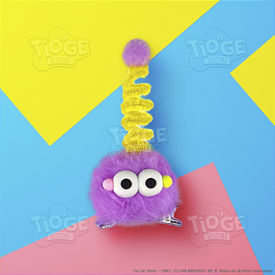 Monstrinho Bolinha de Pelúcia Antena Espiral Presilha Cabelo Maluco Bichinho Olhos Grandes Fofo Engraçado Roxo Amarelo